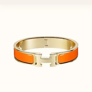 Hermes bracket with silver and orange